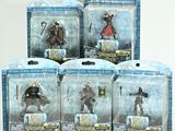 six action figures of the lord of the rings in a display case