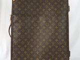 Valise Louis Vuitton en toile Monogram avec finitions en cuir