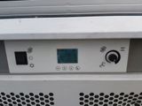 a close up of the controls on a white refrigerator