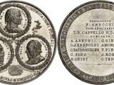 a close up of a silver coin with a group of people on it
