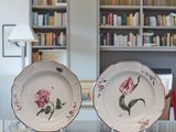 three plates that are sitting on top of a table