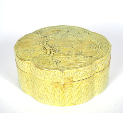 an image of a yellow box sitting on top of a white surface