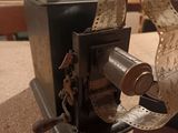 a roll of film sitting on top of a machine