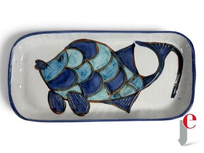 an image of a fish shaped dish on a white surface