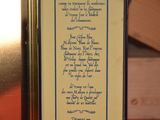 a framed picture of a poem on the wall