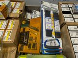 many boxes of electronic devices on display in a store