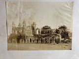 an old photo of a castle with a clock tower on it