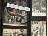 an old photo of a book with pictures of people on it