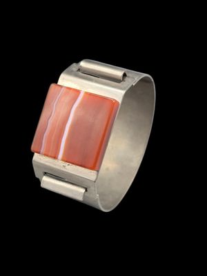Bracelet manchette en métal argenté ornée d'une pierre pierr…
