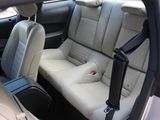 a picture of a car with a seat belt in the back