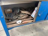 a blue cabinet with a bunch of tools inside of it