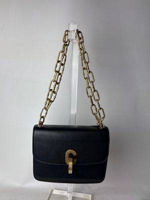 Christian DIOR : sac en cuir noir à fermoir CD articulé en m…