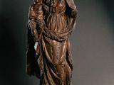 statue of a woman holding a child in her arms