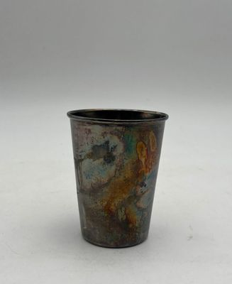a small cup that is sitting on a table