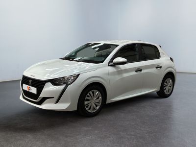 a white car is parked in a room with a gray floor