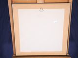 a picture of a picture on a easel with a blue background