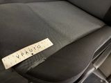 a close up of a seat with a sticker on it