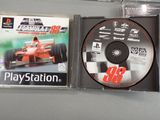 a cd case with a picture of a racing car on it