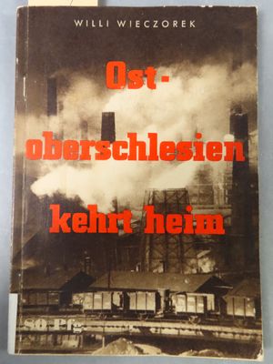 a book with a picture of a factory with smoke coming out of it