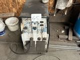 an image of a machine that is sitting in a garage