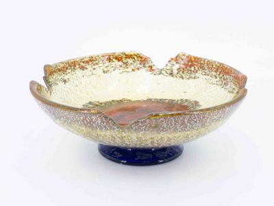 a glass bowl that is sitting on a table