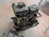 a small engine that is sitting on the floor