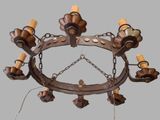 a chandelier made out of wood and metal