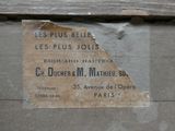 a piece of paper on the side of a building