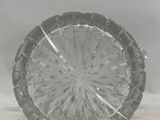 a clear glass plate with a circular design on it