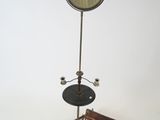 a small table with a mirror on top of it