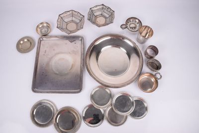 a lot of silver items that are on the table
