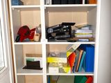 a book shelf with a lot of books on it
