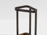 a black metal and wood side table on a white surface