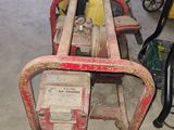 many different types of motorcycles in this garage