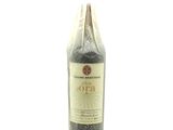 a bottle of wine that is sitting on a table