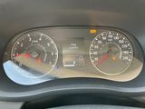 a close up of a car dashboard with a speedometer