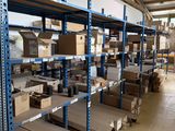 many boxes and boxes on the shelves in the warehouse