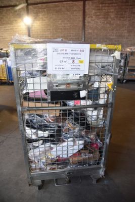a metal cart with many items in it in a warehouse
