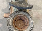 a close up of a shoe on top of a metal object