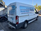 a white van that is parked in the parking lot
