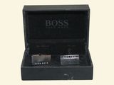 hugo boss cufflinks in a black box with matching cufflinks