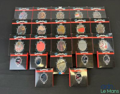 a lot of different colored eyeshades on a table