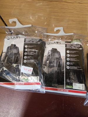 three bags of luggage sitting on a table
