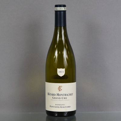 a bottle of wine that is sitting on a table
