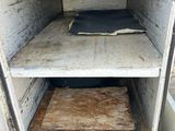 a small oven that has a lot of food inside of it
