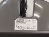 a black and white photo of a computer mouse on a desk