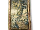 an image of a tapestry hanging on the wall of a room
