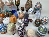 many different types of painted easter eggs on the table