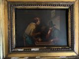 une photo d'un tableau représentant un homme et une femme assis à une table