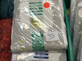 many different types of bedding on display in a store